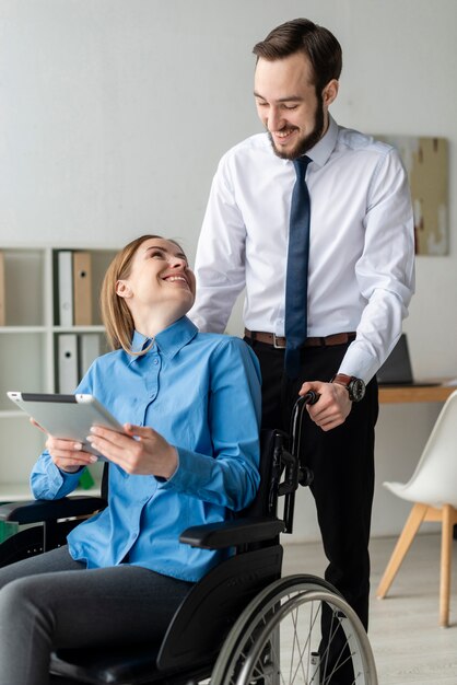 Adult man and woman together at office