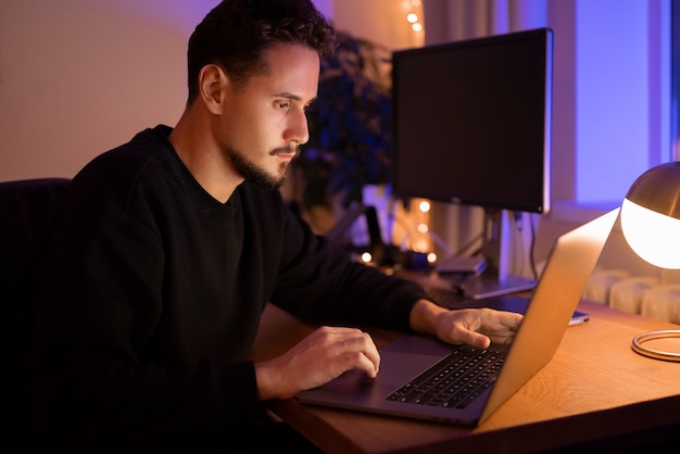 Free photo adult person working late at night from home