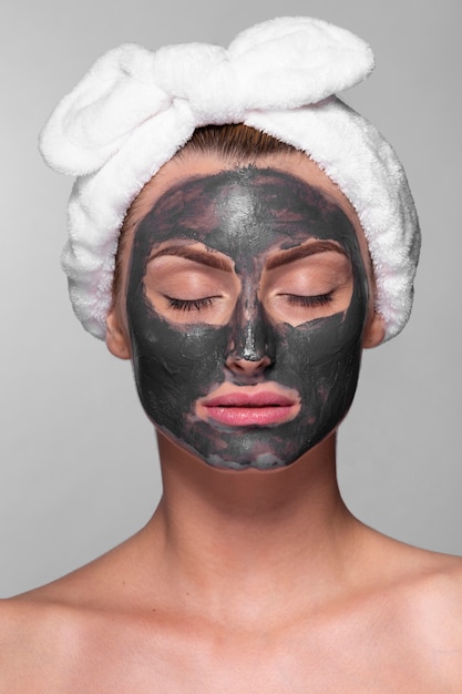 Free photo adult woman enjoying face mask