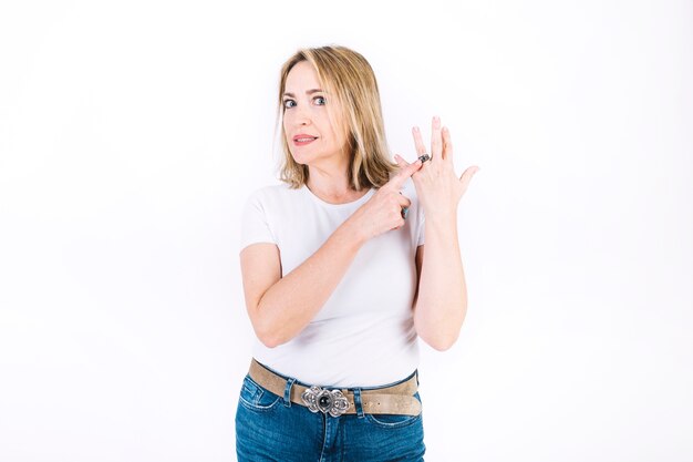 Adult woman pointing at ring