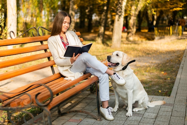 Adult woman sitting on a bench