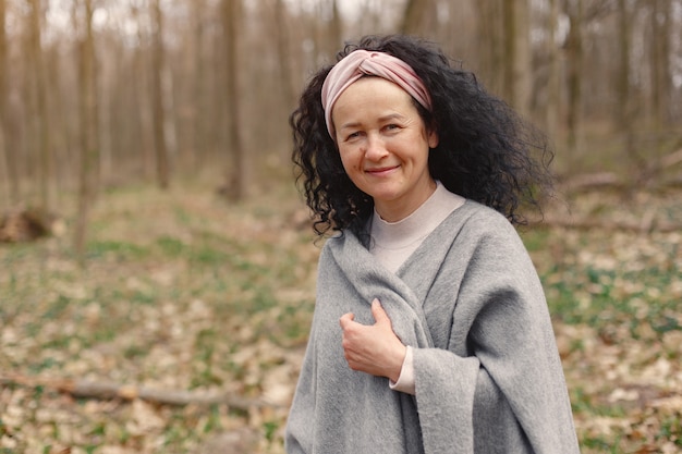 Adult woman in a spring forest