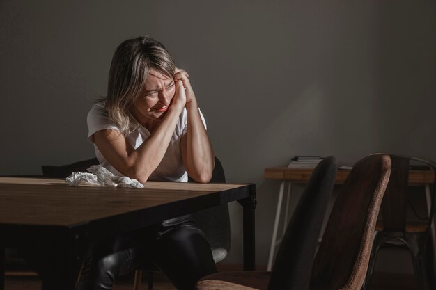 Adult woman stressing out at home