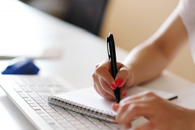 Adult woman working at office