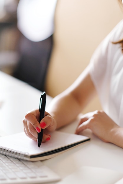 Adult woman working at office