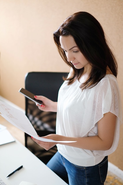 Free photo adult woman working at office