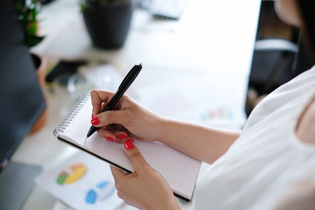 Adult woman working at office