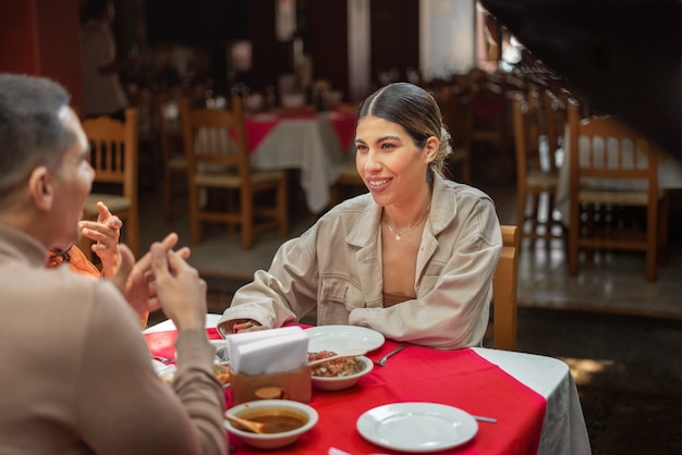 Free photo adults enjoying mexican food