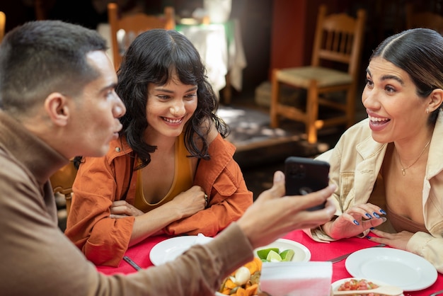 Free photo adults enjoying mexican food