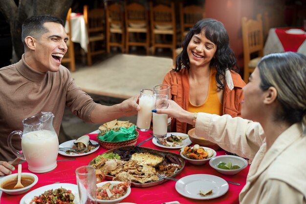 Adults enjoying mexican food