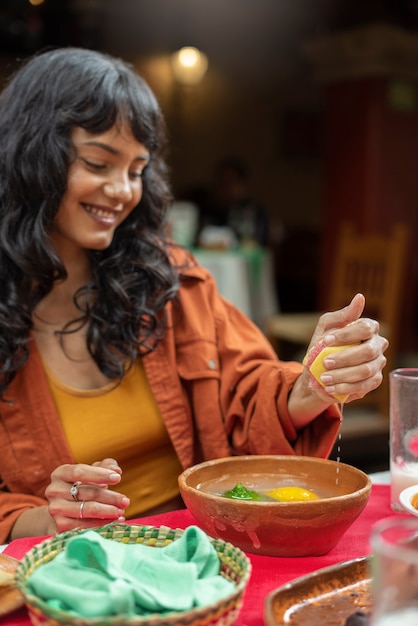 Adults enjoying mexican food