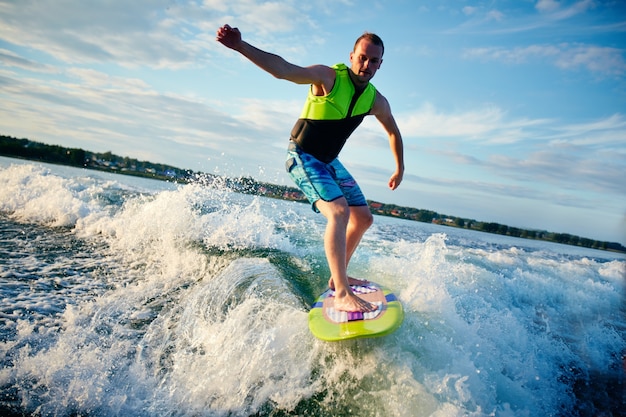 Adventurous surfer having a good time