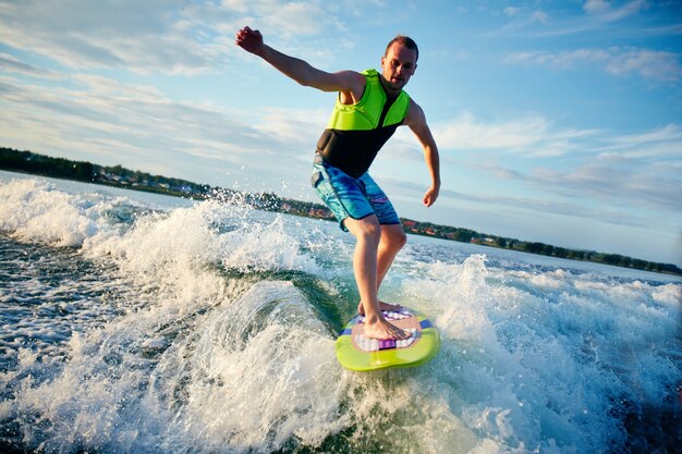 Adventurous surfer having a good time