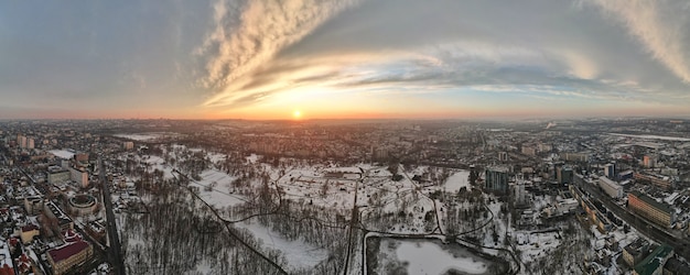 Aerial drone panorama view of Chisinau, Moldova at sunset.