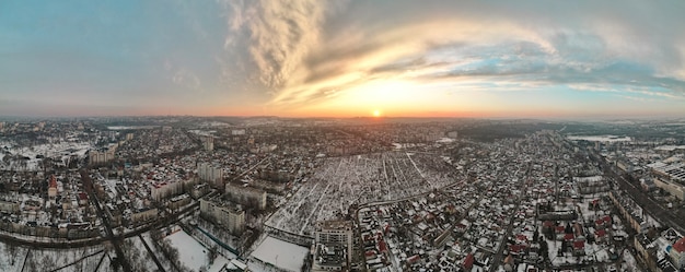 Aerial drone panorama view of Chisinau, Moldova at sunset.