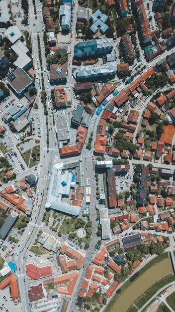 Aerial drone shot of the beautiful city architecture at daytime during Winter