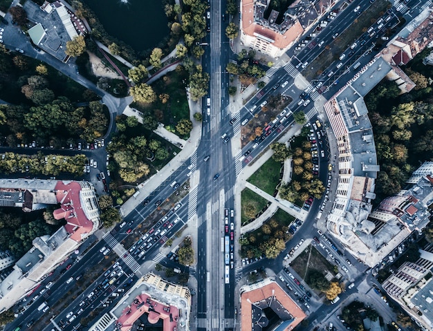 Aerial drone shot of an urban city busy road intersection
