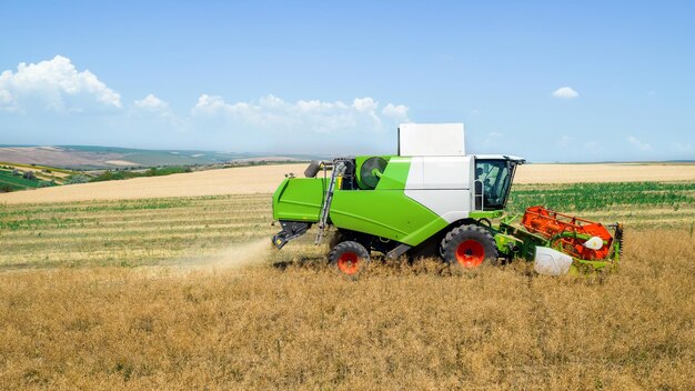 Aerial drone view of the harvester gathering crops