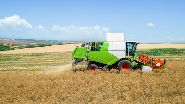 Aerial drone view of the harvester gathering crops