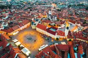 Free photo aerial drone view of the historic centre of sibiu at evening romania