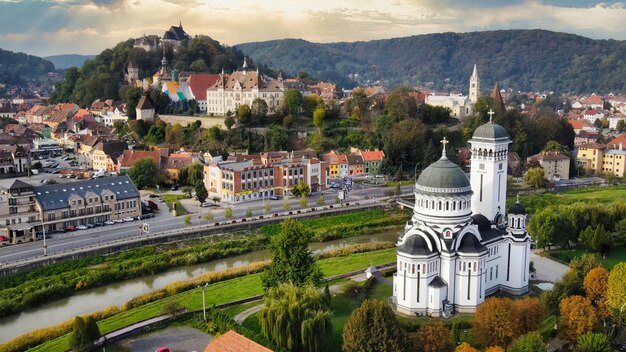 Aerial drone view of the Historic Centre of Sighisoara Romania Old buildings Holy Trinity Church