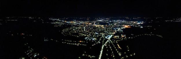 Aerial drone view of a town in Moldova at night. Nightlights