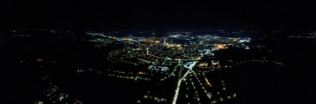 Aerial drone view of a town in Moldova at night. Nightlights