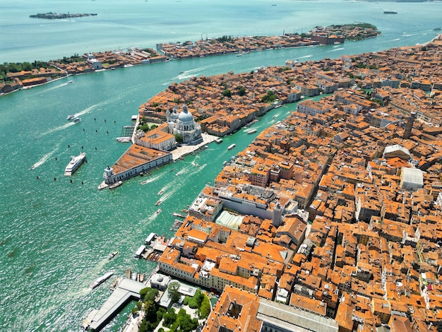 Aerial drone view of venice italy water channels with multiple floating and moored boats