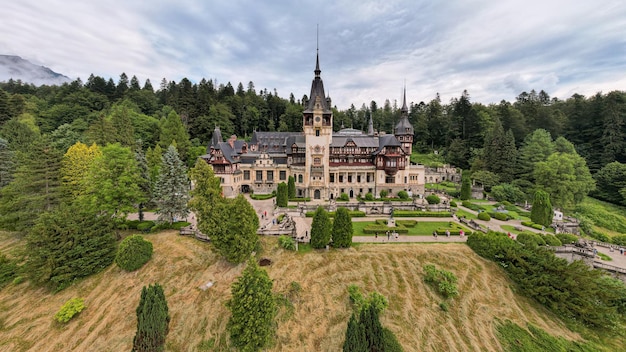 Aerial drone wide view of The Peles Castle in Romania