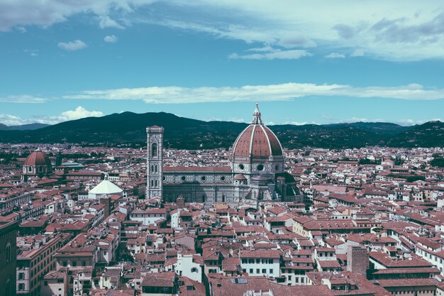 Aerial panoramic view of old city of florence and cattedrale di santa maria del fiore (cathedral of saint mary of the flower) from palazzo vecchio