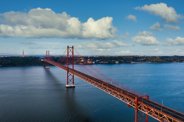 Free photo aerial shot of 25th of april bridge, lisbon