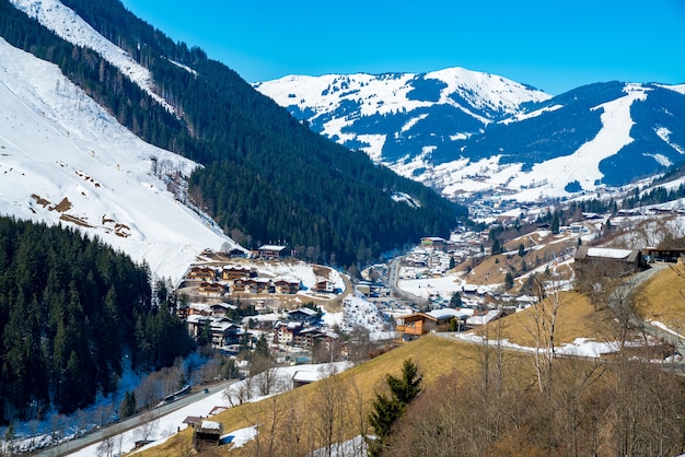 Aerial shot of Austrian Alps village during a winter day