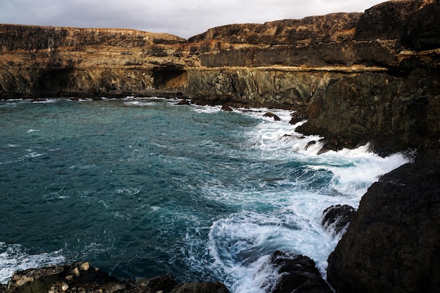 Aerial shot of a beach next to the village Ajuy in  Canary Islands, Spain