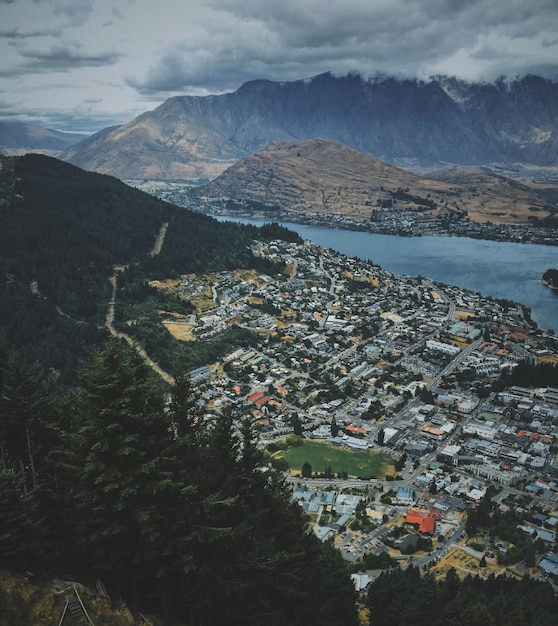 Aerial shot of the beautiful Queenstown near the lake with mountains