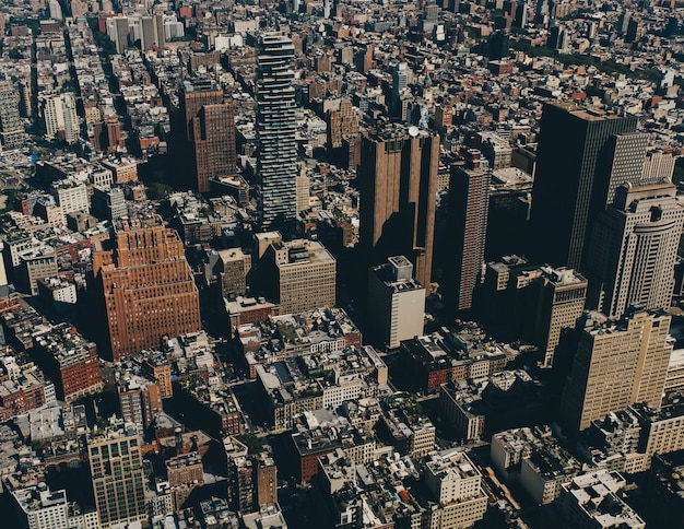 Aerial shot of buildings in a city at daytime