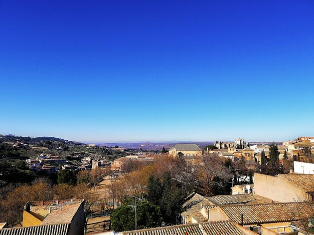 Aerial shot of the city and hill in Toledo, Spain