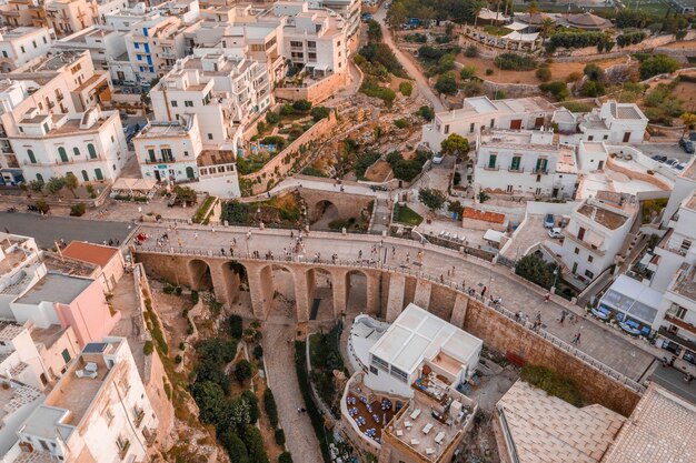 Aerial shot of the cityscape of Polignano a Mare town in Puglia region, Italy