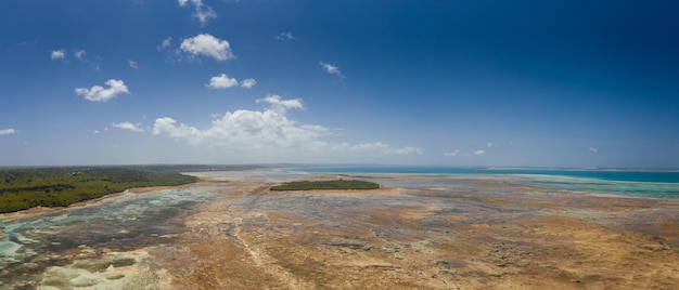 Aerial shot of coastline and seabed of Zanzibar Island Tanzania Africa