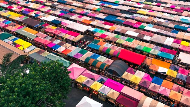 Aerial shot of colorful market tents