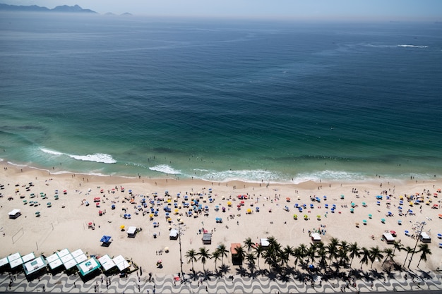 Aerial shot of Copacabana beach in Rio de Janeiro Brazil crowded with people