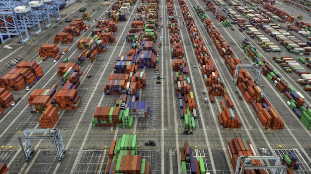 Free photo aerial shot of large shipping containers area