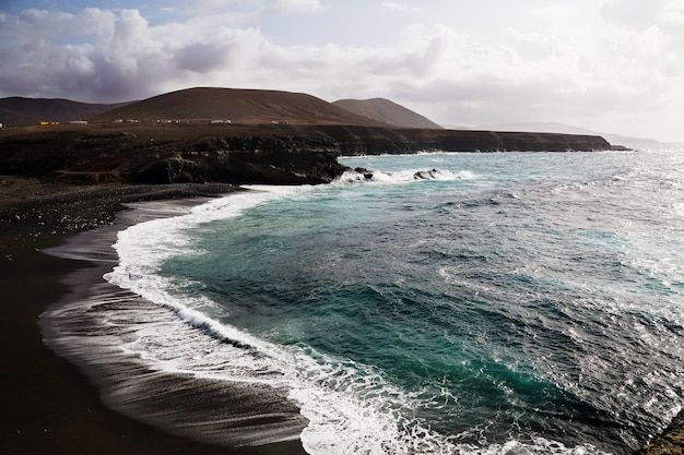 Aerial shot of Playa de Ajuy beach in Ajuy, Spain