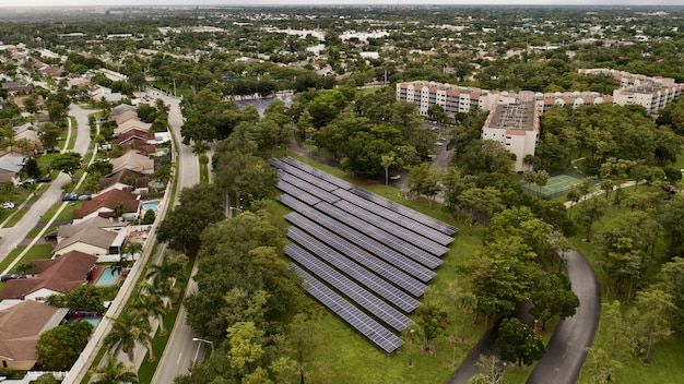 Aerial shot of solar panels in a cascade in the field in Florida