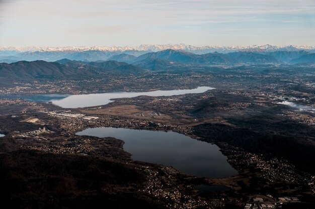 Aerial shot of a suburban valley with scenic lakes