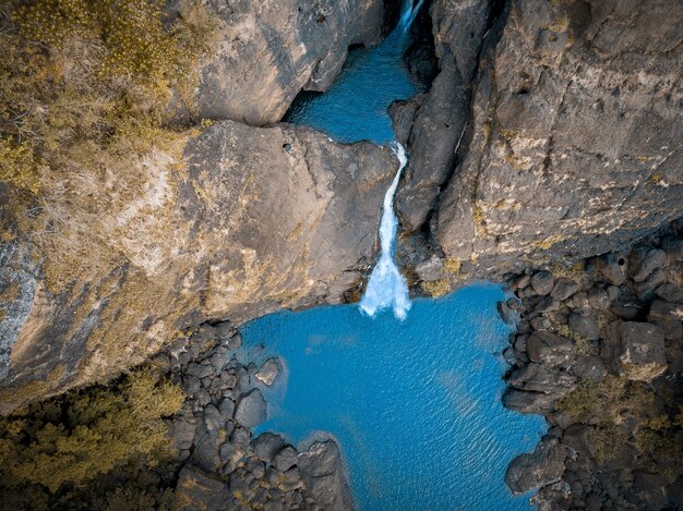 Aerial shot of a waterfall in Papua New Guinea