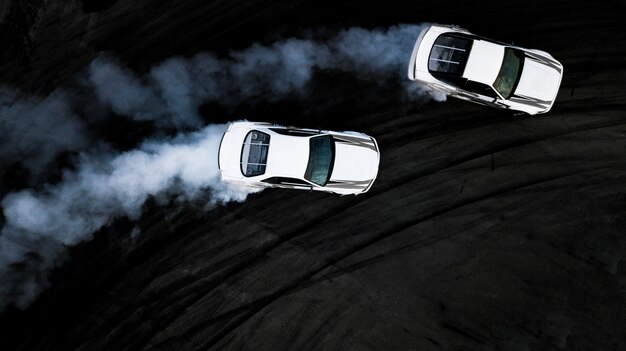 Premium Photo | Top view drifting car, aerial view professional driver ...