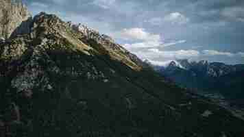 Free photo aerial view of beautiful mountains in albania and cloudy sky on a sunny day