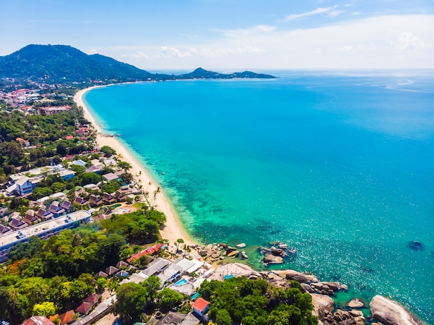 Aerial view of beautiful tropical beach and sea with palm and other tree in koh samui island