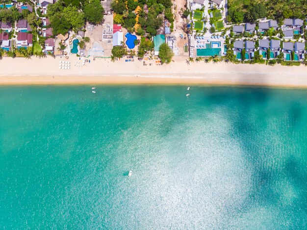 Aerial view of beautiful tropical beach and sea with trees on island