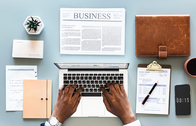 Aerial view of businessman using computer laptop